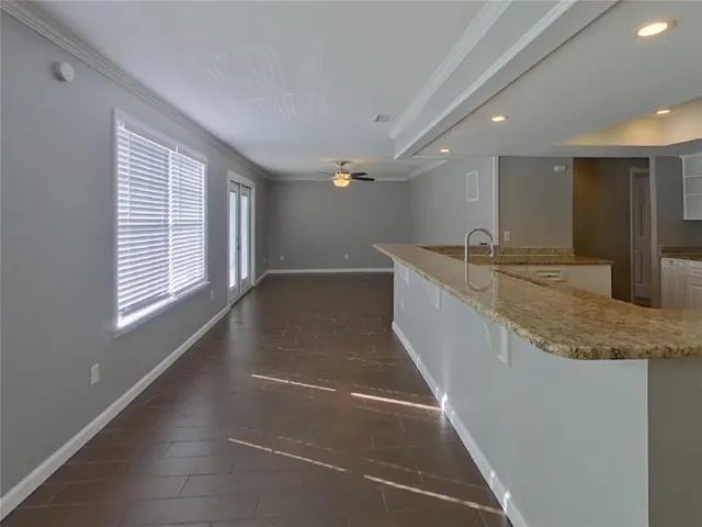 a view of a sink and window in a room
