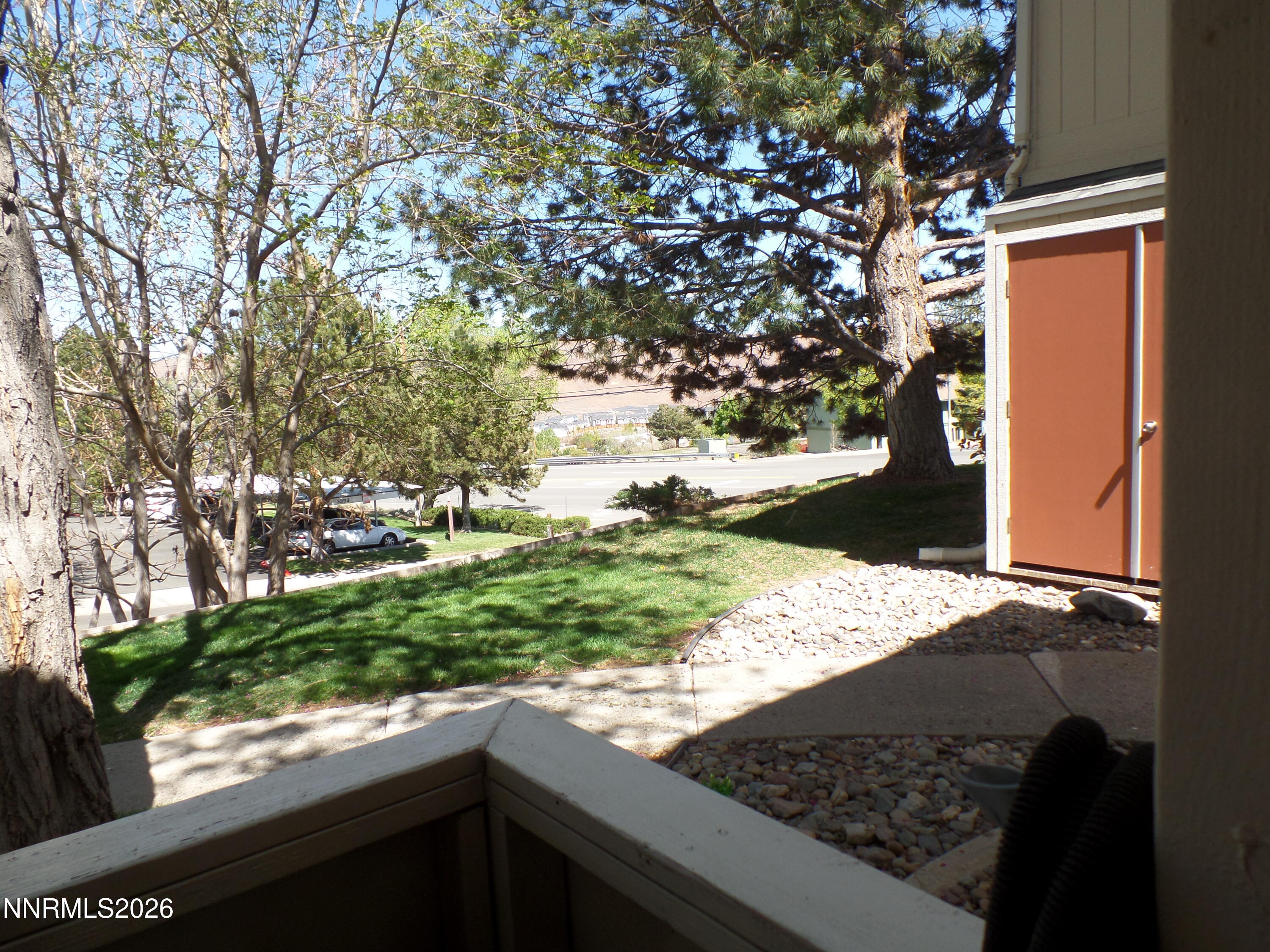 3890 East Leonesio Drive, Unit D1 Reno, NV 89512 - Photo 27 of 32 a view of a backyard of the house