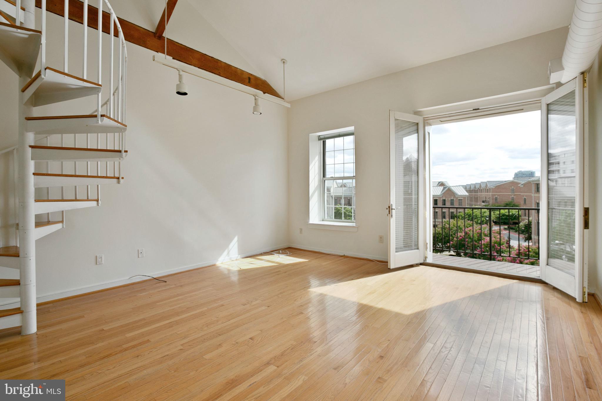 2639 Boston Street, Unit 313 Baltimore, MD 21224 - Photo 3 of 33 French Doors open up to your private balcony