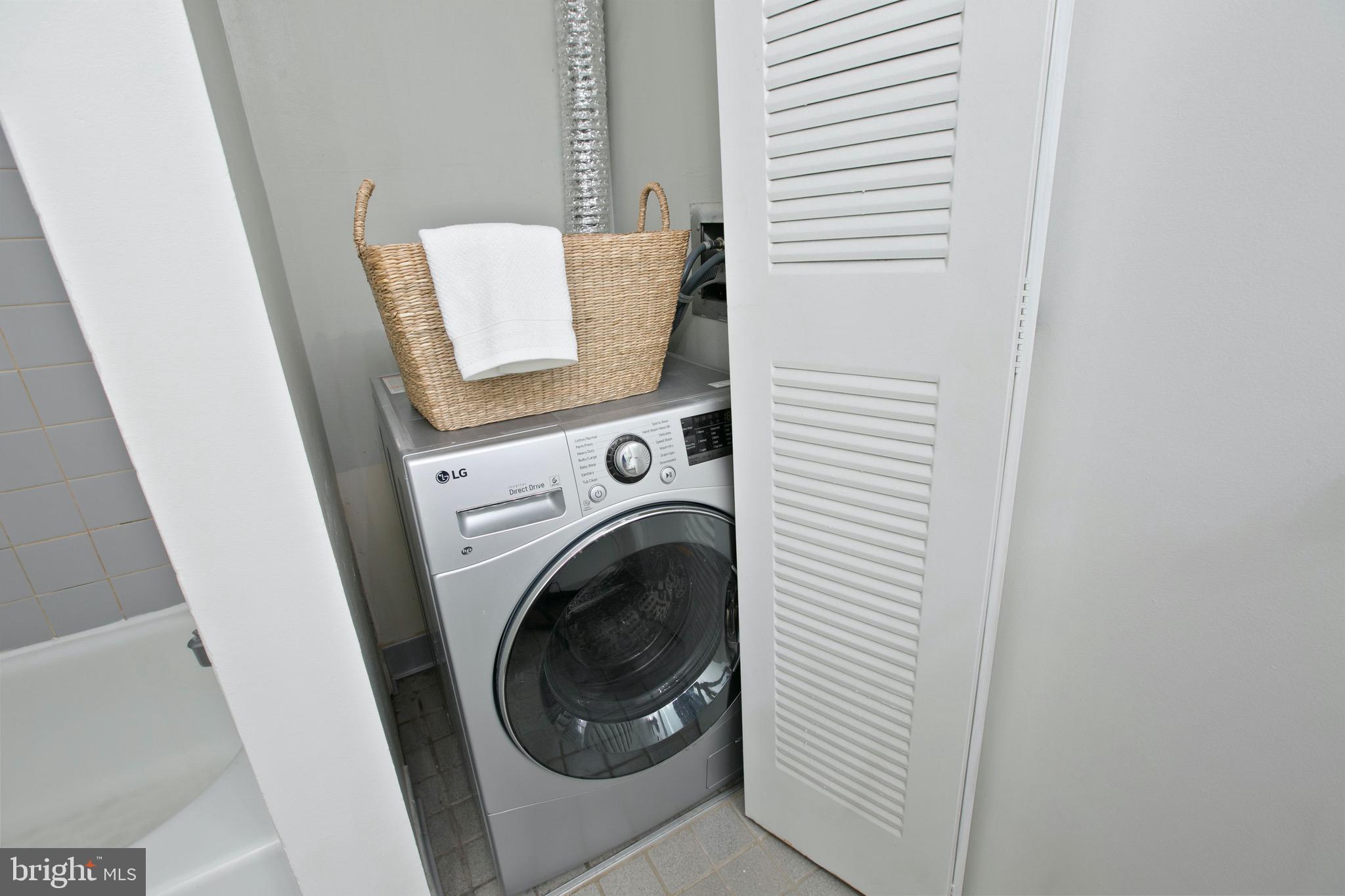 2639 Boston Street, Unit 313 Baltimore, MD 21224 - Photo 22 of 33 washer/dryer combo located in the full bathroom