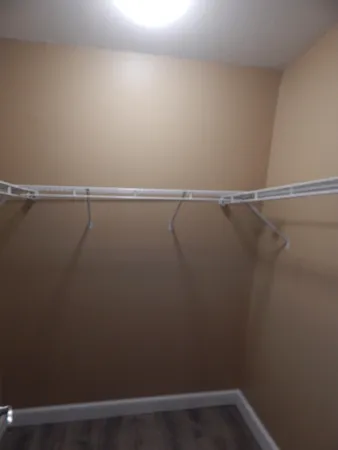 a view of a room with racks on the wall