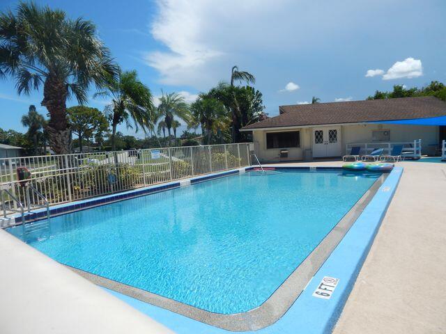 110 North Delaware Boulevard, Unit 13C Jupiter, FL 33458 - Photo 37 of 37 Sims Creek - Pool Pic
