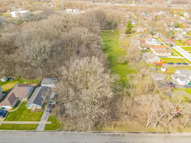a view of yard with swimming pool