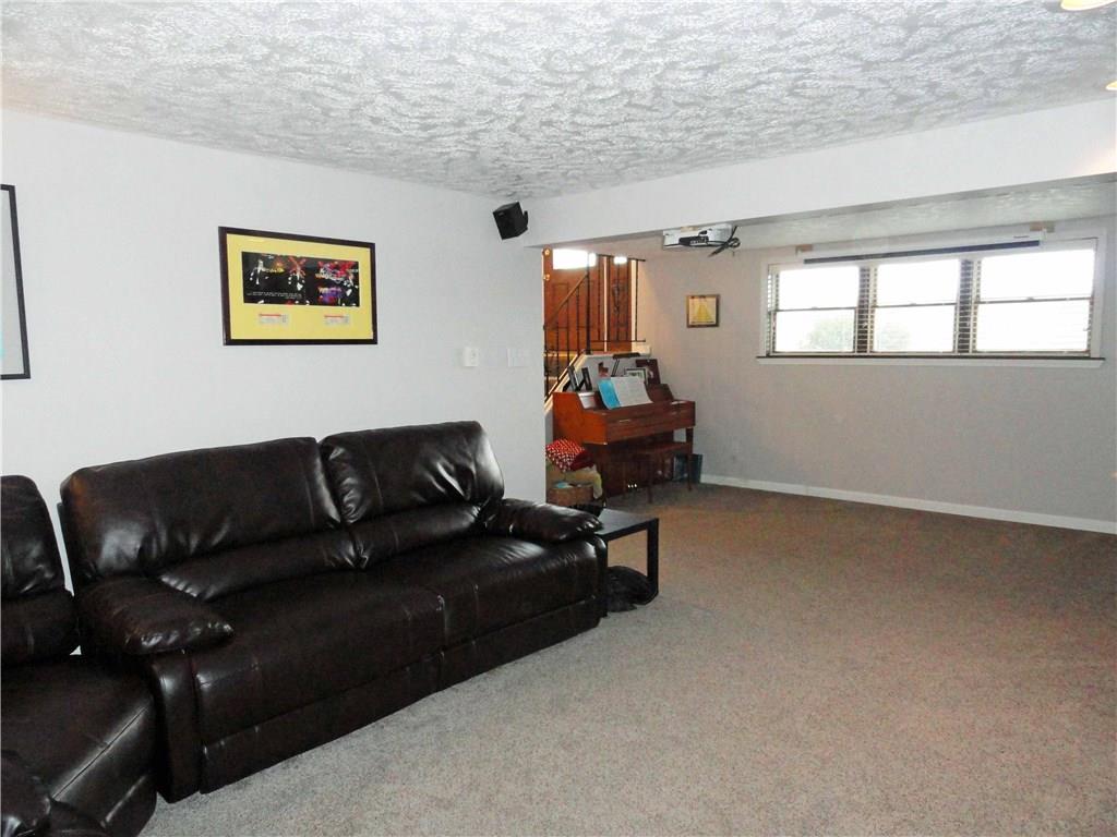 204 Sandy Hill Road Manor, PA 15642 - Photo 22 of 25 24 x 14 family room with lots of light