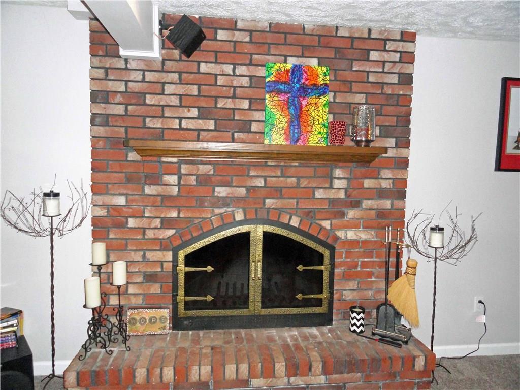 204 Sandy Hill Road Manor, PA 15642 - Photo 24 of 25 Brick, log burning fireplace in family room