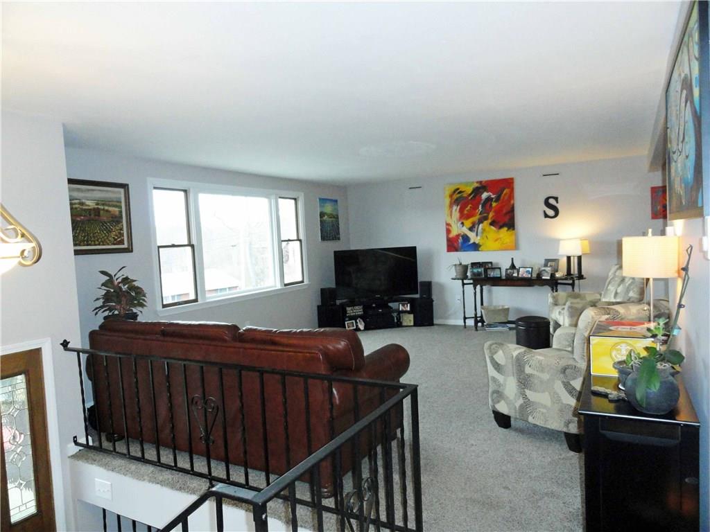 204 Sandy Hill Road Manor, PA 15642 - Photo 4 of 25 Spacious living room. Newly finished walls & freshly painted throughout.