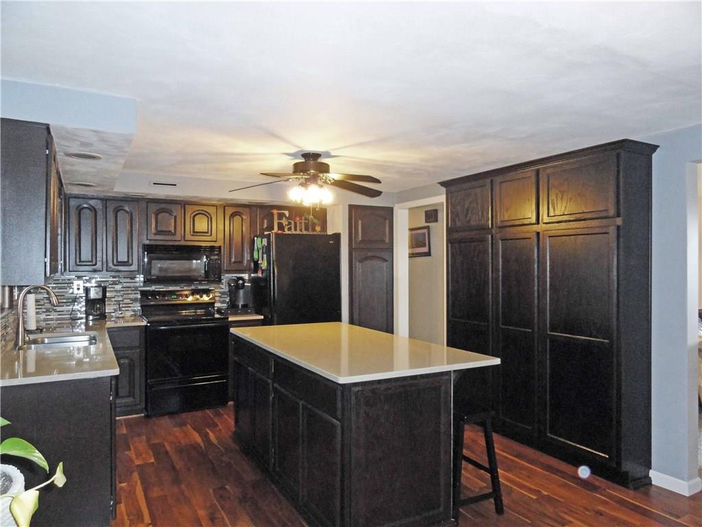 204 Sandy Hill Road Manor, PA 15642 - Photo 7 of 25 A wall of cabinets for lots of storage