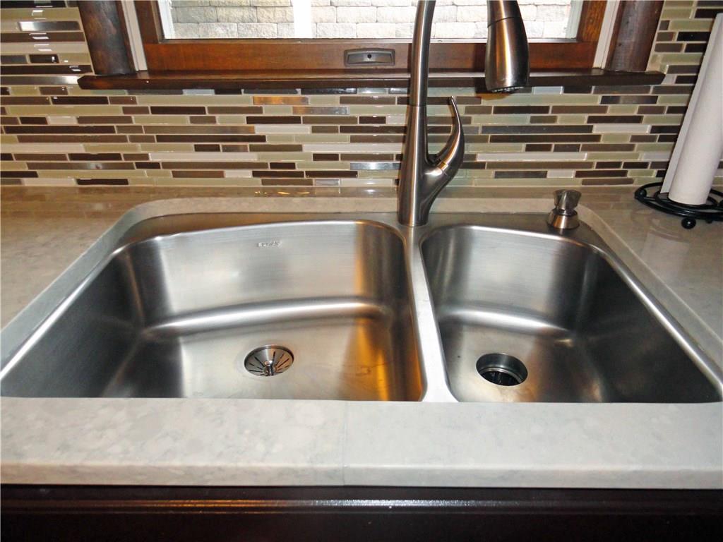 204 Sandy Hill Road Manor, PA 15642 - Photo 9 of 25 Under mount sink and mosaic tile back splash