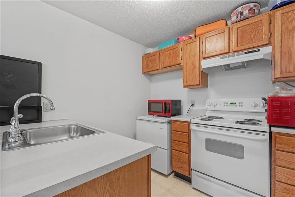 412 Blue Ridge Drive Coraopolis, PA 15108 - Photo 25 of 31 Lower Level Game Room Kitchenette