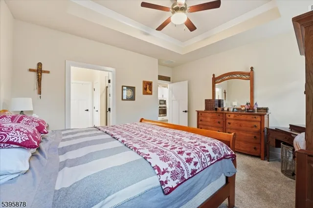 a bathroom with a double vanity sink toilet and shower