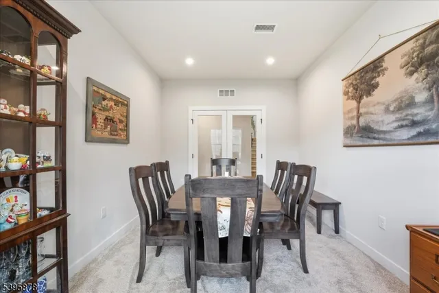 a bathroom with a sink toilet and mirror