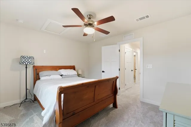 a view of a house with backyard patio and swimming pool