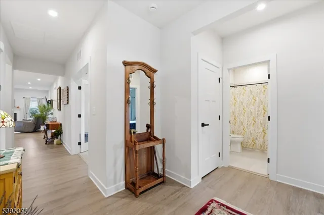 a large kitchen with stainless steel appliances lots of counter space and a sink