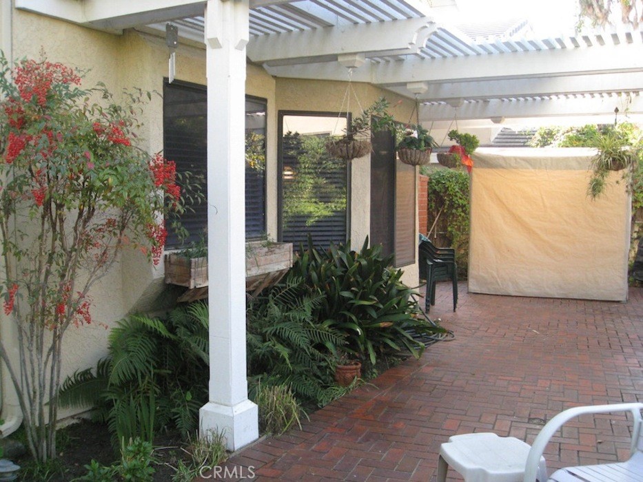 25 Morning Breeze, Unit 46 Irvine, CA 92603 - Photo 22 of 26 a view of a balcony with plants