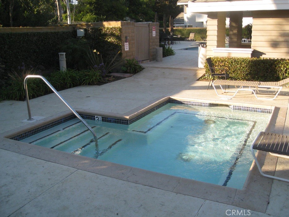 25 Morning Breeze, Unit 46 Irvine, CA 92603 - Photo 26 of 26 swimming pool view with a outdoor space