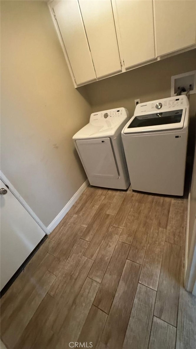 25 Morning Breeze, Unit 46 Irvine, CA 92603 - Photo 9 of 26 a utility room with dryer and washer