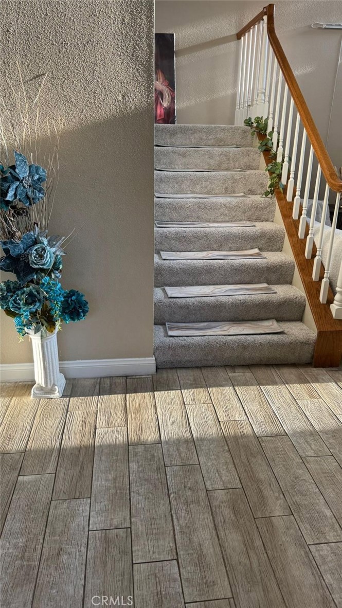 25 Morning Breeze, Unit 46 Irvine, CA 92603 - Photo 10 of 26 a view of entryway with a potted plant