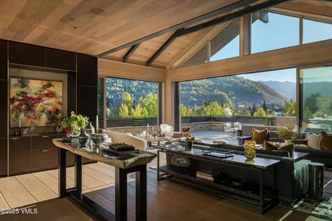 a room with furniture and a large window