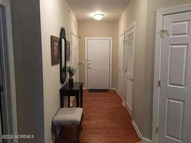 a hallway with seating area