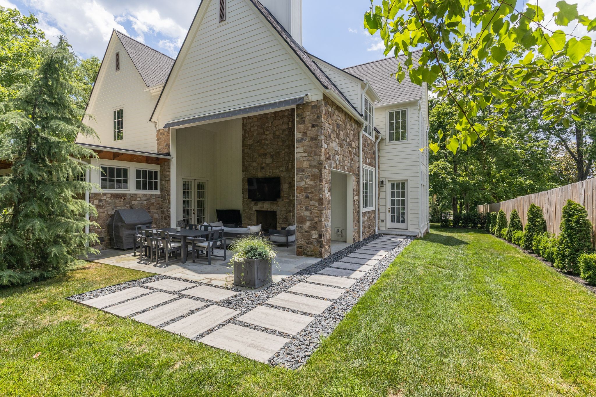 2402 Valley Brook Road Nashville, TN 37215 - Photo 73 of 75 a view of house with patio outdoor seating and yard