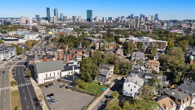 an aerial view of a city with lots of residential buildings