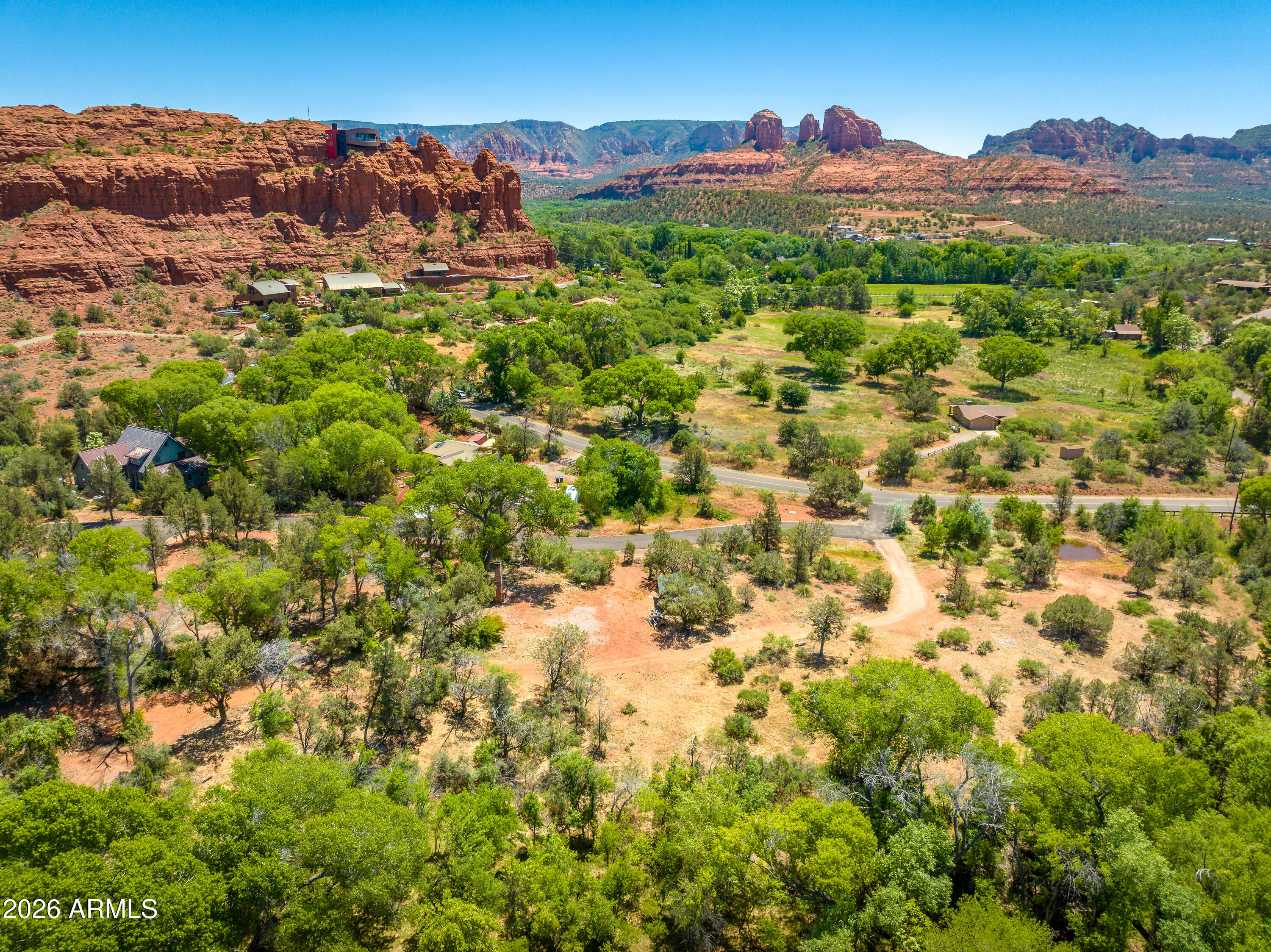 3155 Red Rock Loop Road, Unit 2 Sedona, AZ 86336 - Photo 4 of 22 a view of a city with a mountain in the background