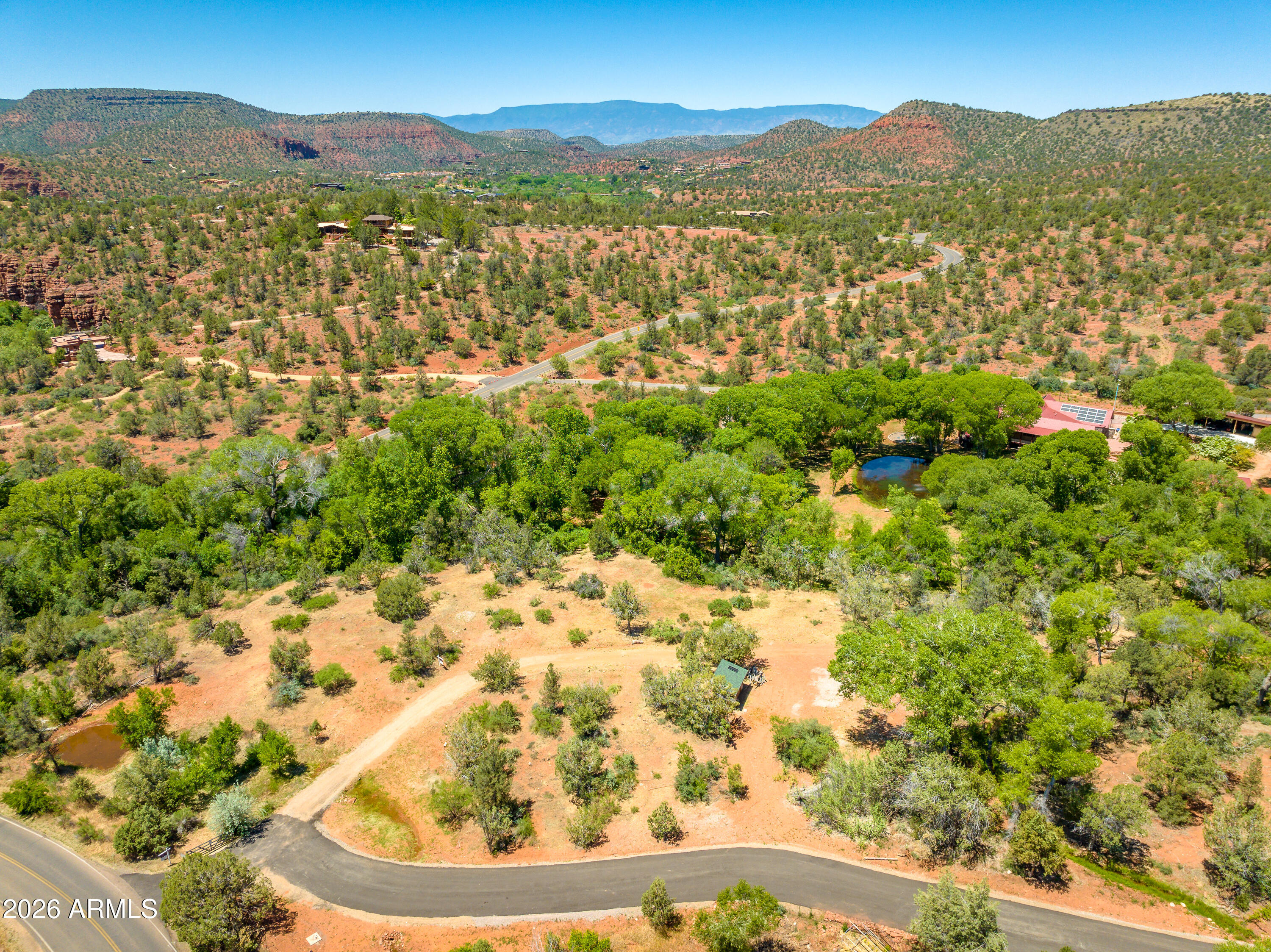 3155 Red Rock Loop Road, Unit 2 Sedona, AZ 86336 - Photo 7 of 22 a view of a mountain with a outdoor space
