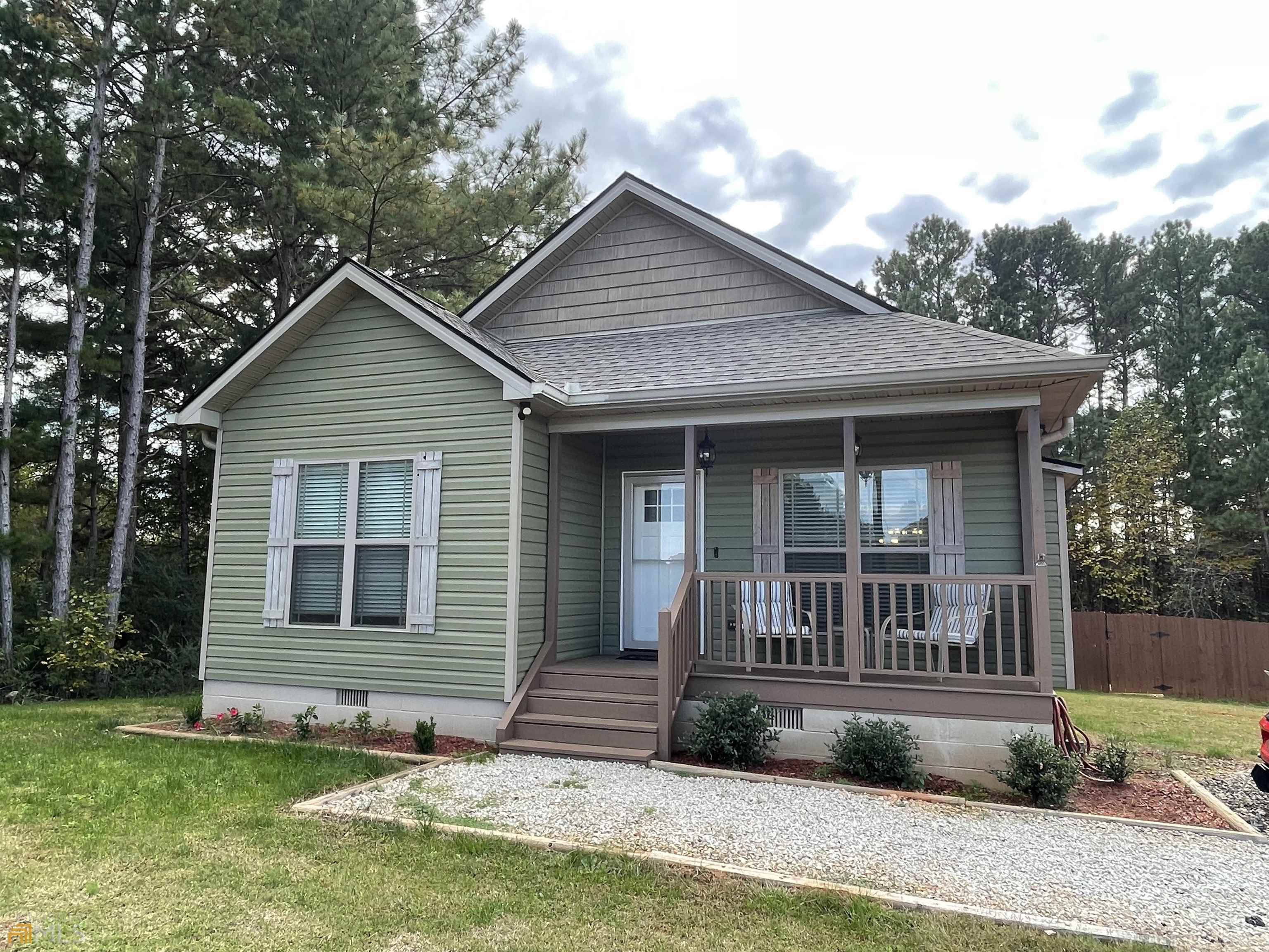 2020 Davis Road Eastanollee, GA 30538 - Photo 1 of 1 a front view of a house with a yard