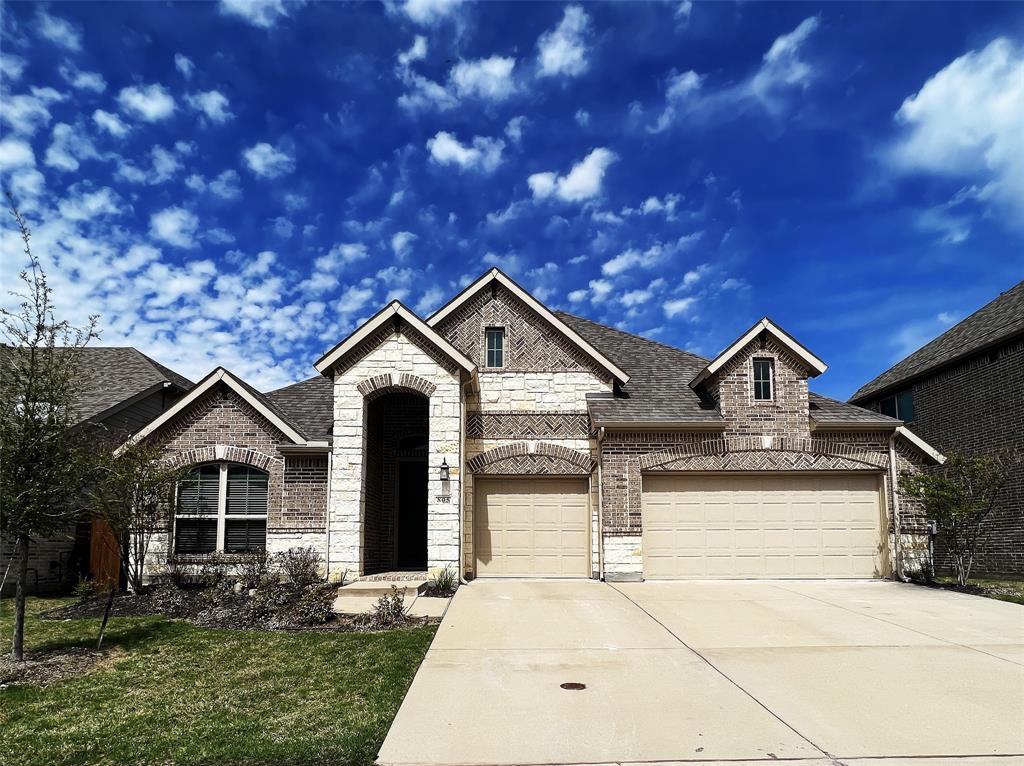 805 Overton Avenue Celina, TX 75009 - Photo 1 of 1 a front view of a house with garden