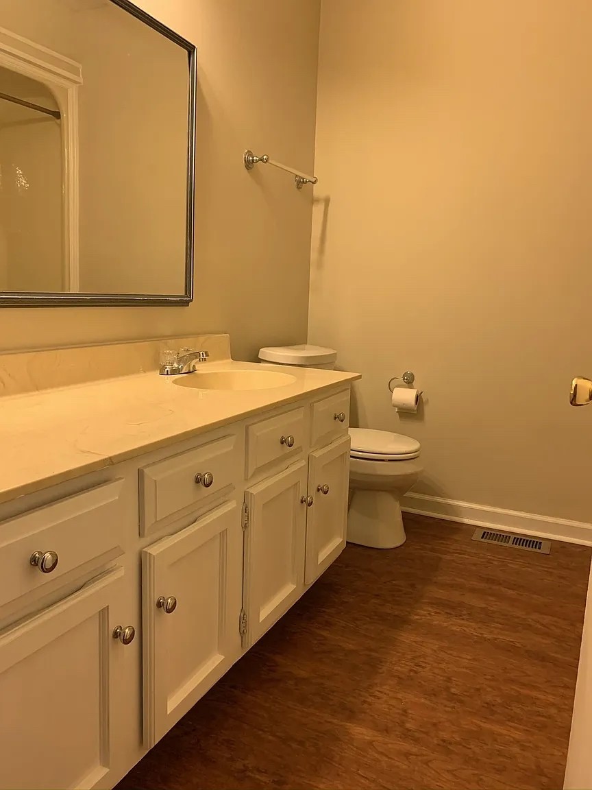 7420 Huntwick Trail Nashville, TN 37221 - Photo 12 of 19 a bathroom with a granite countertop toilet and sink