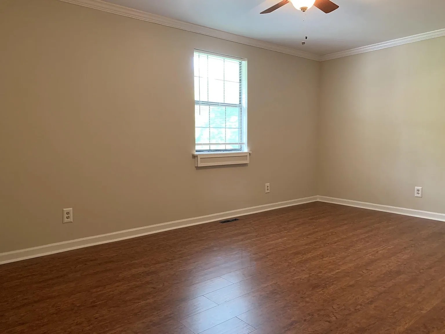 7420 Huntwick Trail Nashville, TN 37221 - Photo 14 of 19 a view of an empty room with wooden floor and a window
