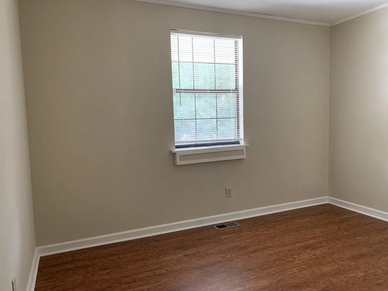 7420 Huntwick Trail Nashville, TN 37221 - Photo 16 of 19 an empty room with wooden floor and windows