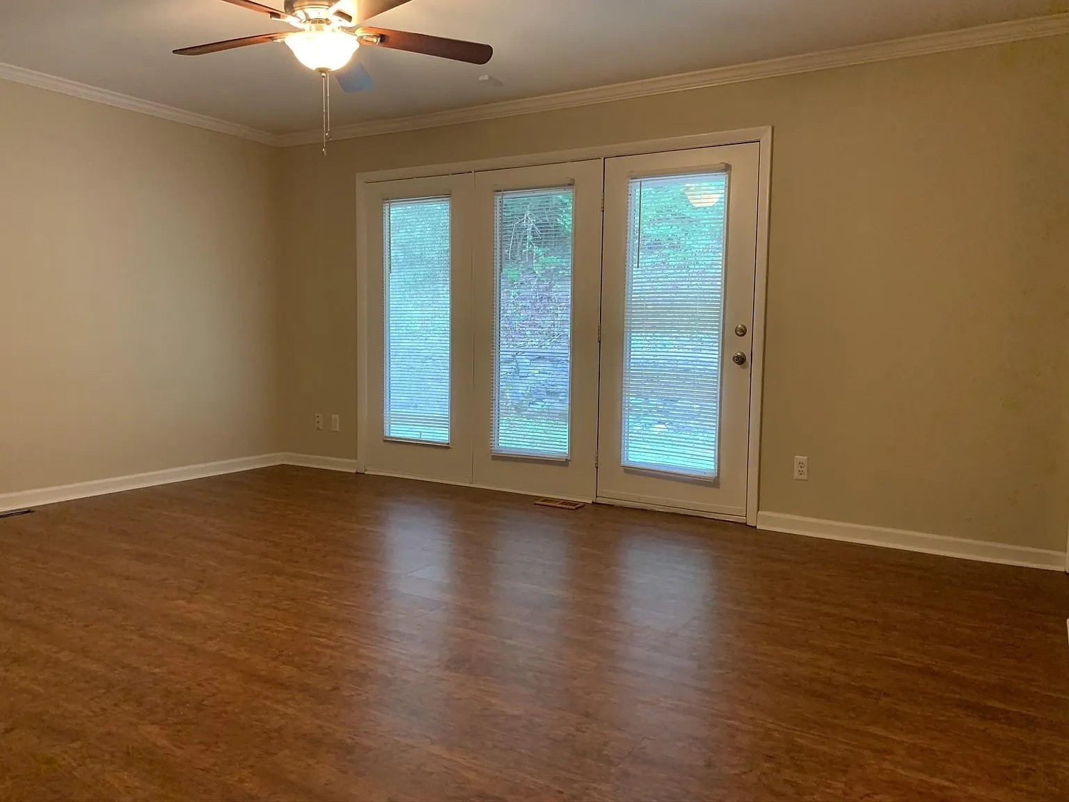 7420 Huntwick Trail Nashville, TN 37221 - Photo 10 of 19 a view of an empty room with wooden floor and a window