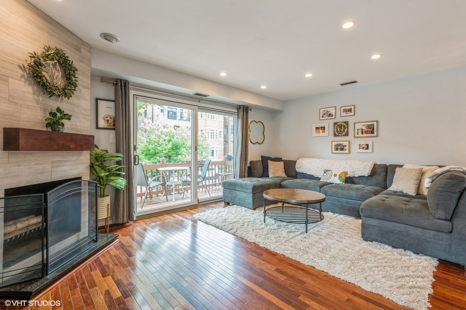1045 West Altgeld Street, Unit A Chicago, IL 60614 - Photo 3 of 17 a living room with furniture and a fireplace
