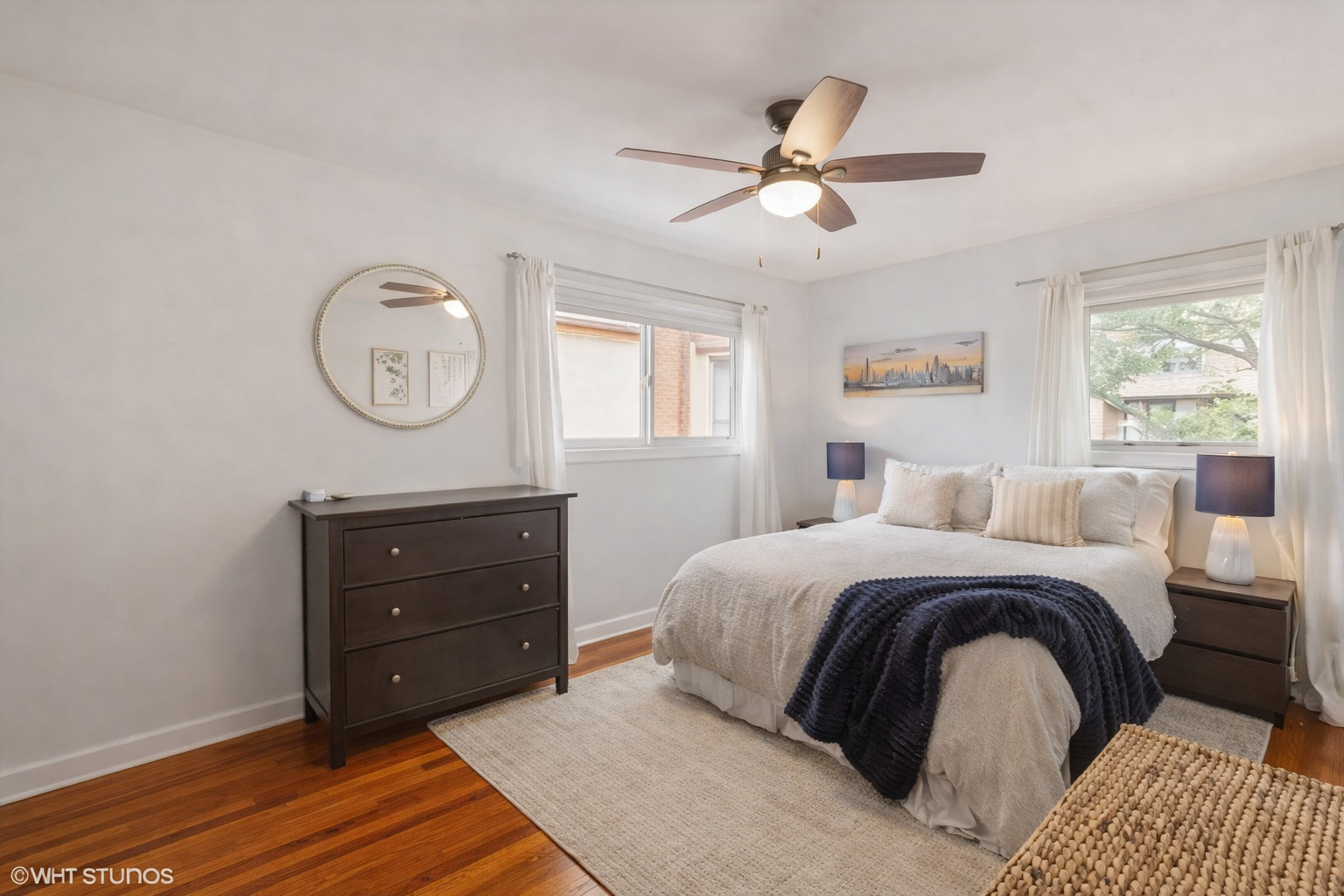 1045 West Altgeld Street, Unit A Chicago, IL 60614 - Photo 10 of 17 a bedroom with a bed and window