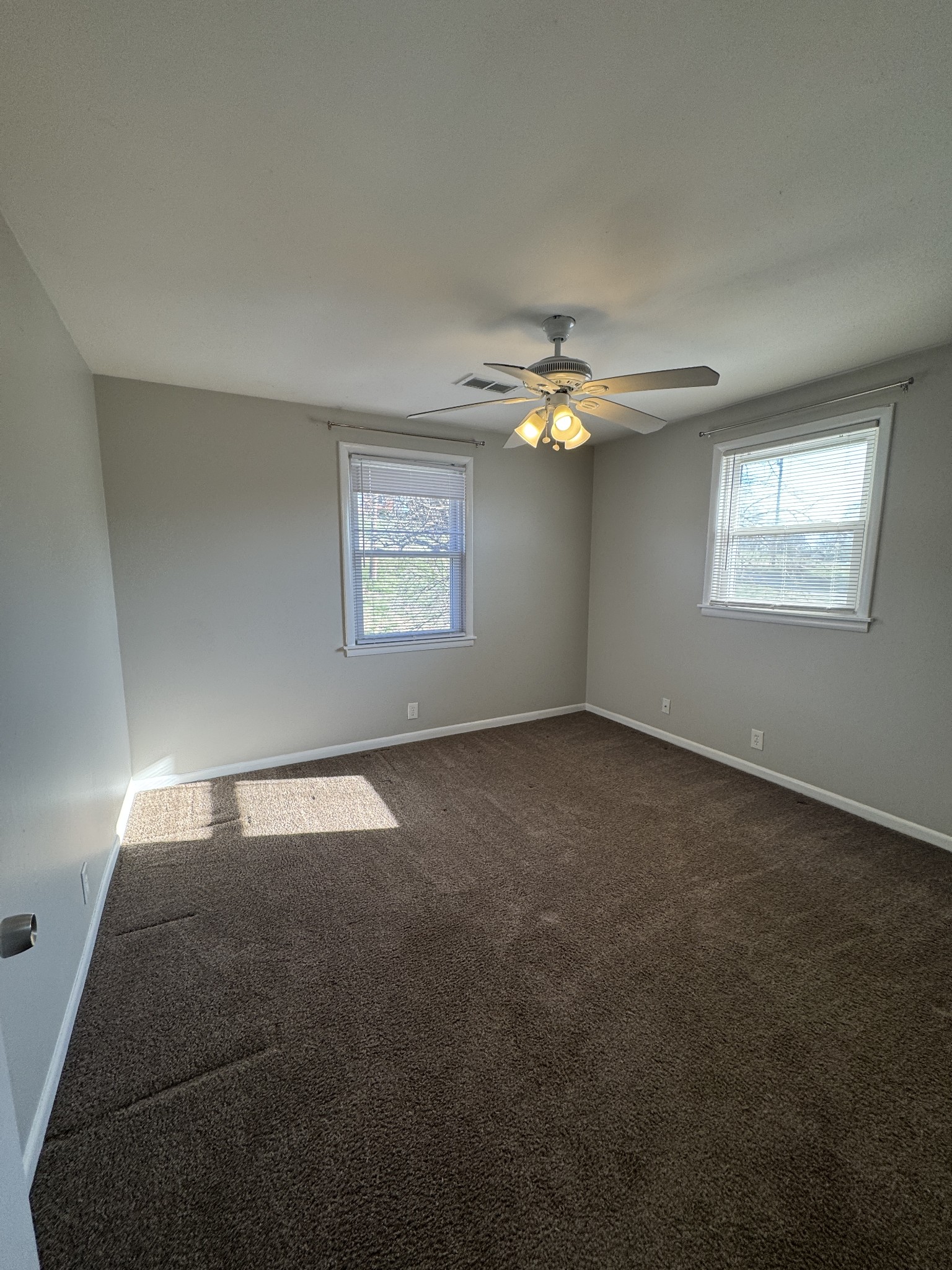 929 Allen Road, Unit B Nashville, TN 37214 - Photo 7 of 7 a view of an empty room with a window