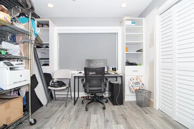a view of a patio with a dining table and chairs