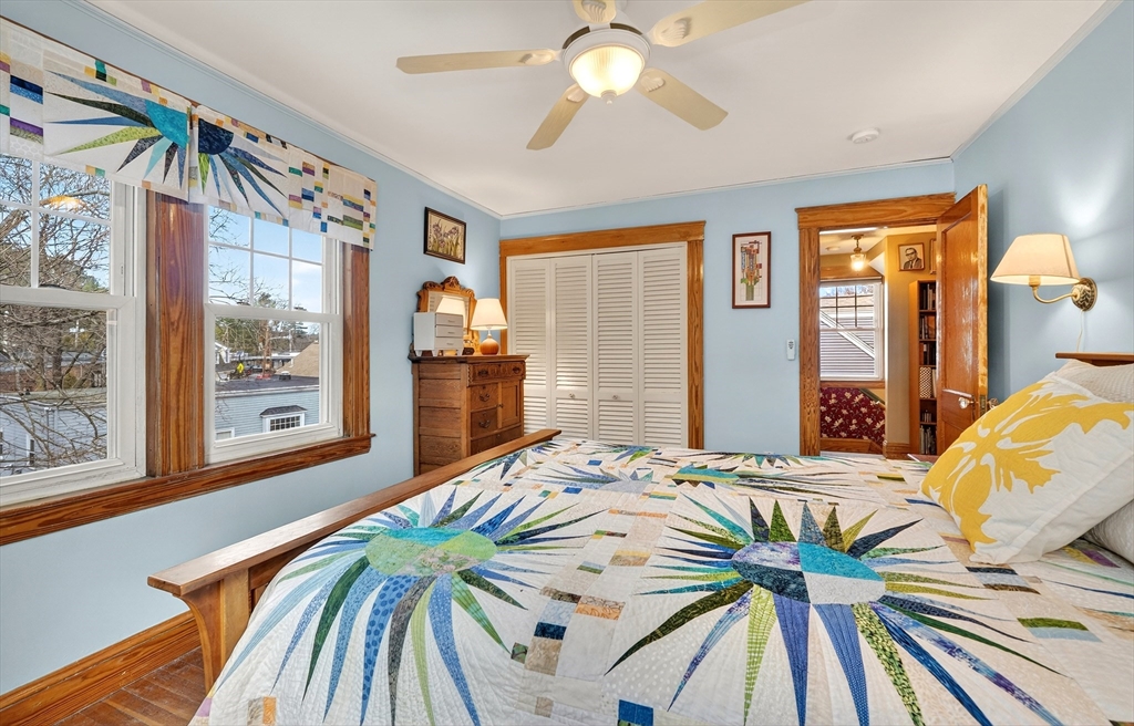 49 Pond Street Westwood, MA 02090 - Photo 16 of 36 a bedroom with a bed and a large window