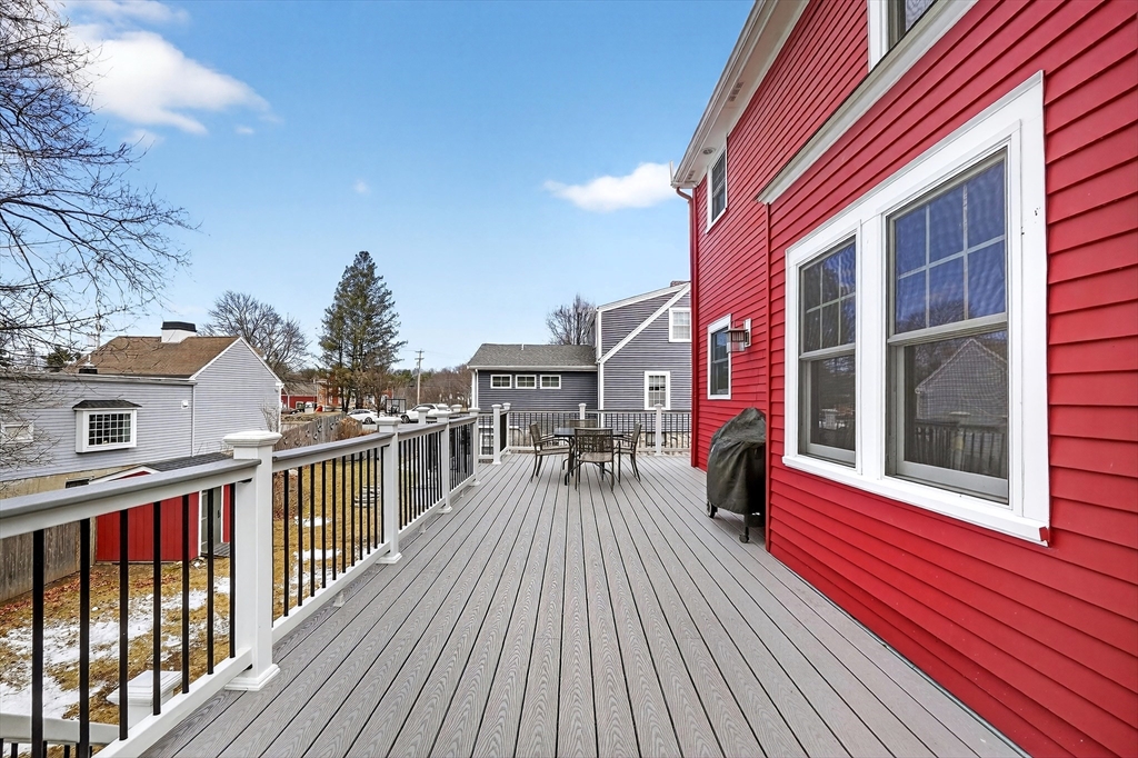 49 Pond Street Westwood, MA 02090 - Photo 28 of 36 a view of a house with wooden deck