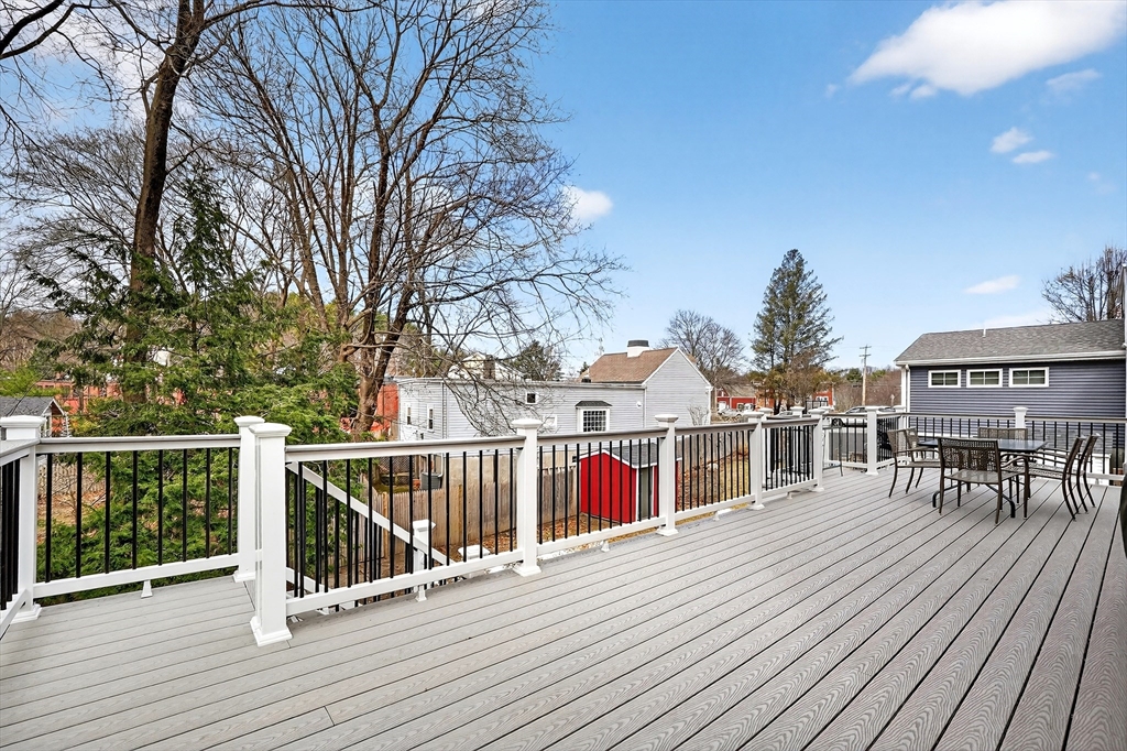 49 Pond Street Westwood, MA 02090 - Photo 29 of 36 a view of a house with wooden deck