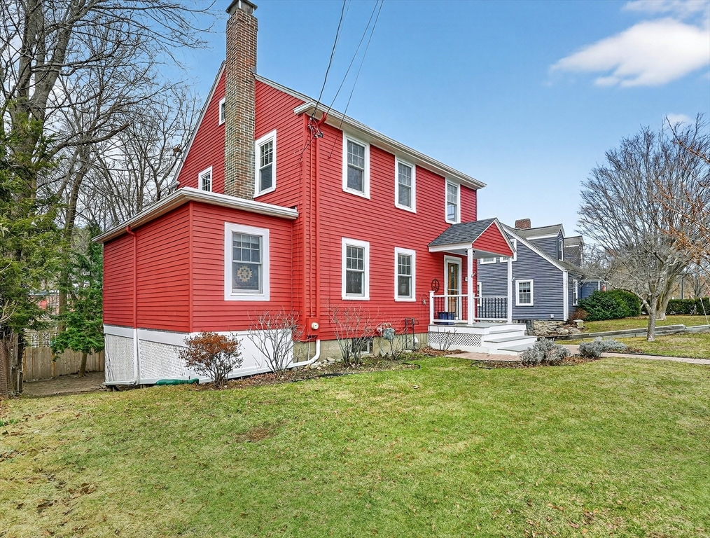 49 Pond Street Westwood, MA 02090 - Photo 30 of 36 a front view of a house with a yard