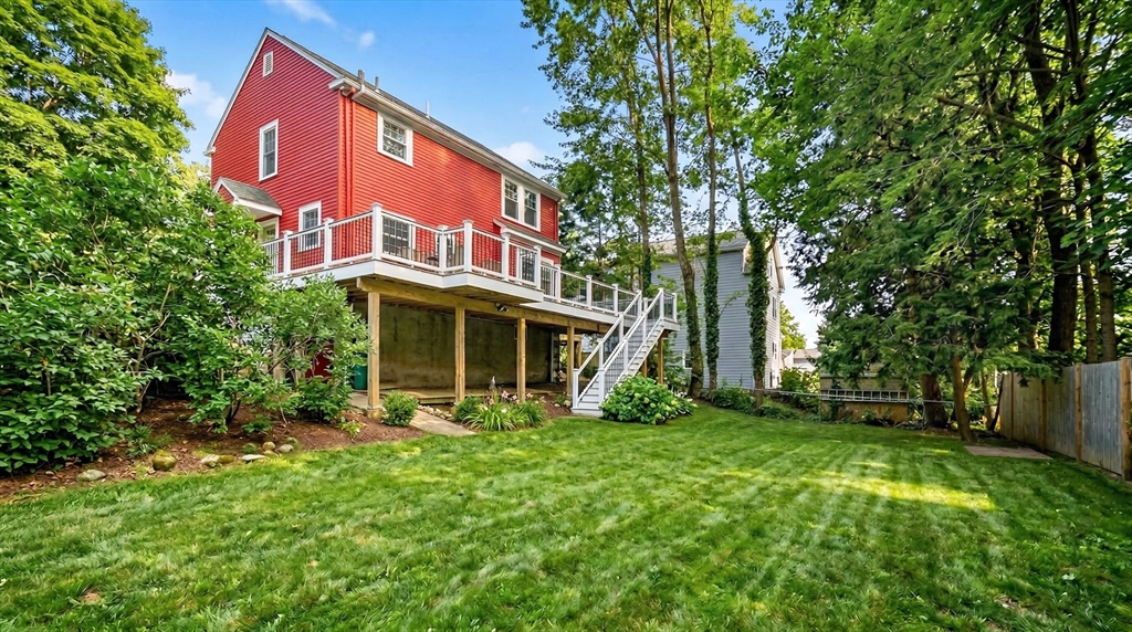 49 Pond Street Westwood, MA 02090 - Photo 32 of 36 a front view of a house with garden
