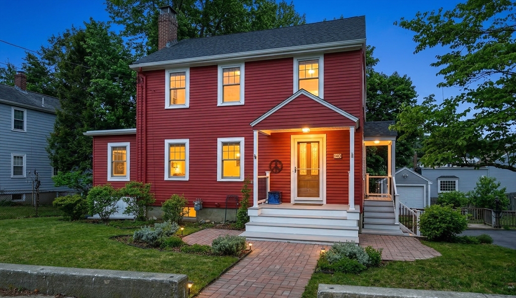 49 Pond Street Westwood, MA 02090 - Photo 35 of 36 a front view of a house with garden