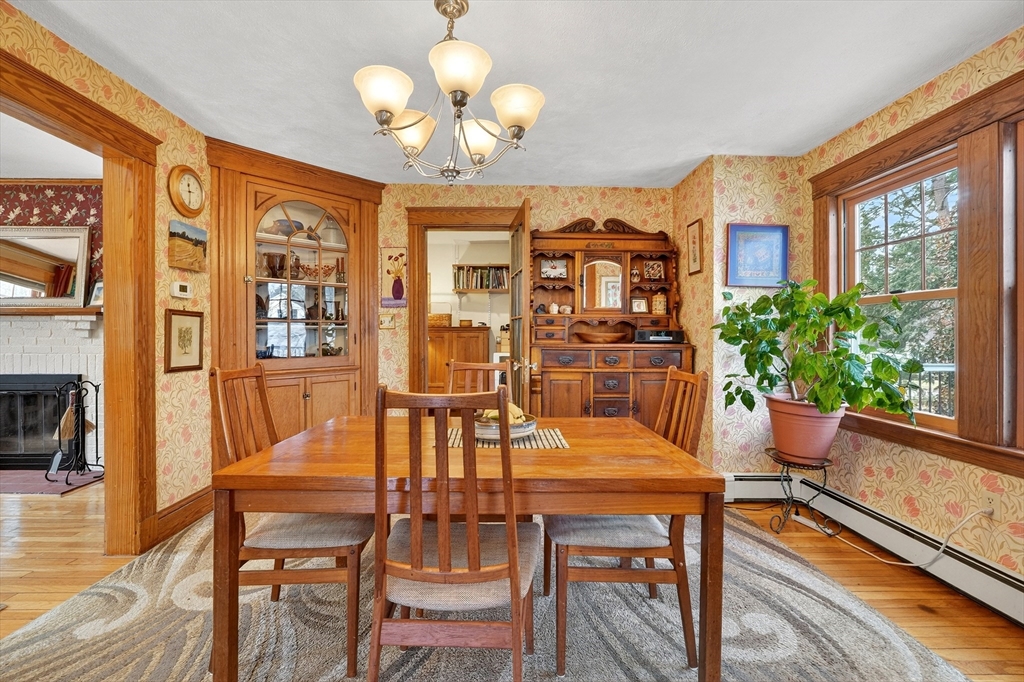 49 Pond Street Westwood, MA 02090 - Photo 9 of 36 a view of a dining room with furniture window and wooden floor