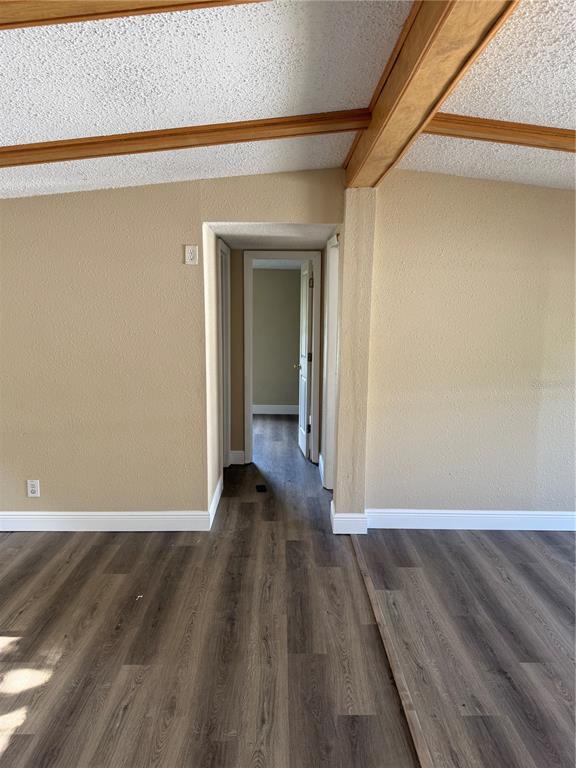 7229 Allyson Street Port Richey, FL 34668 - Photo 10 of 11 a view of a room with wooden floor and a window