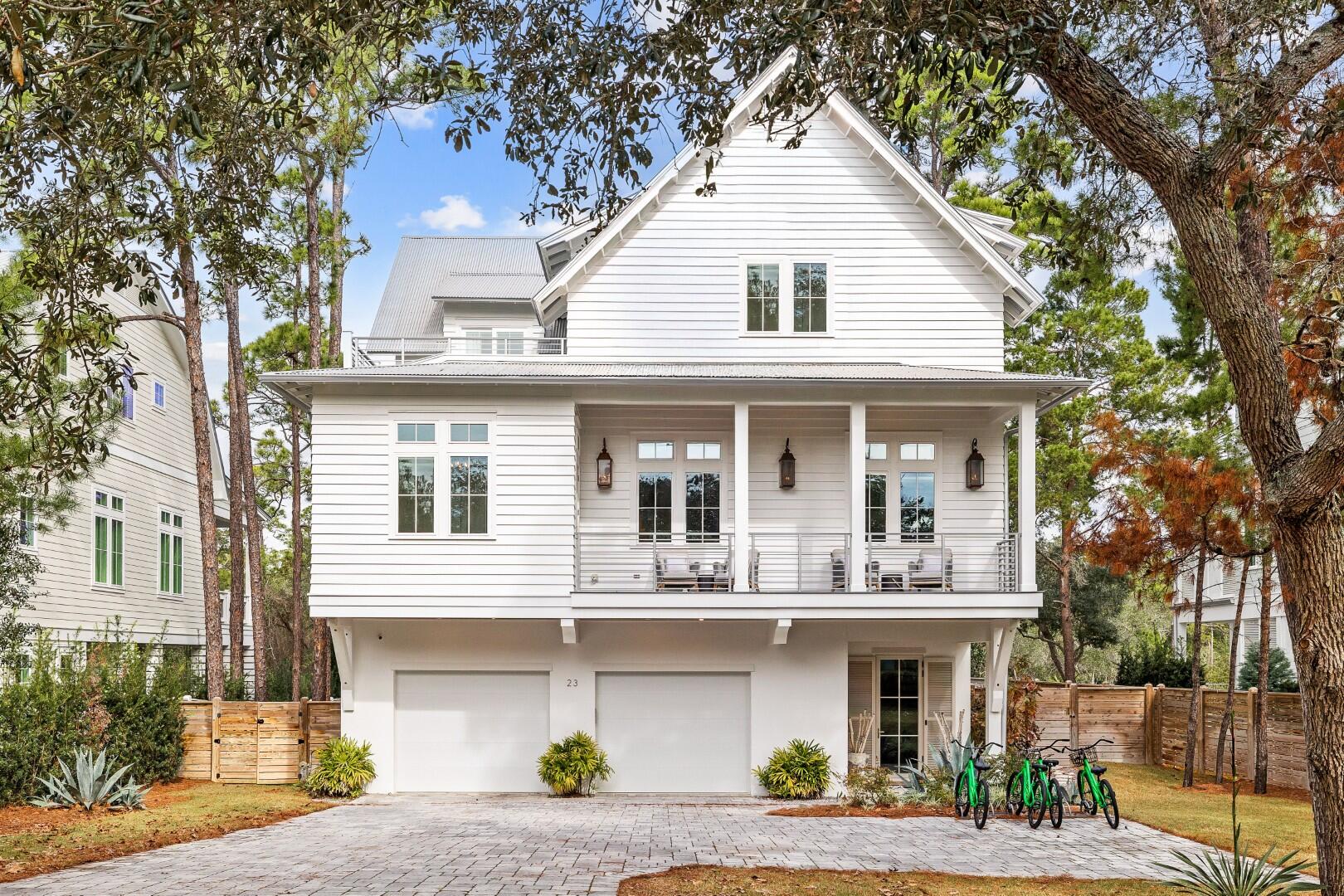 a front view of a house with garage