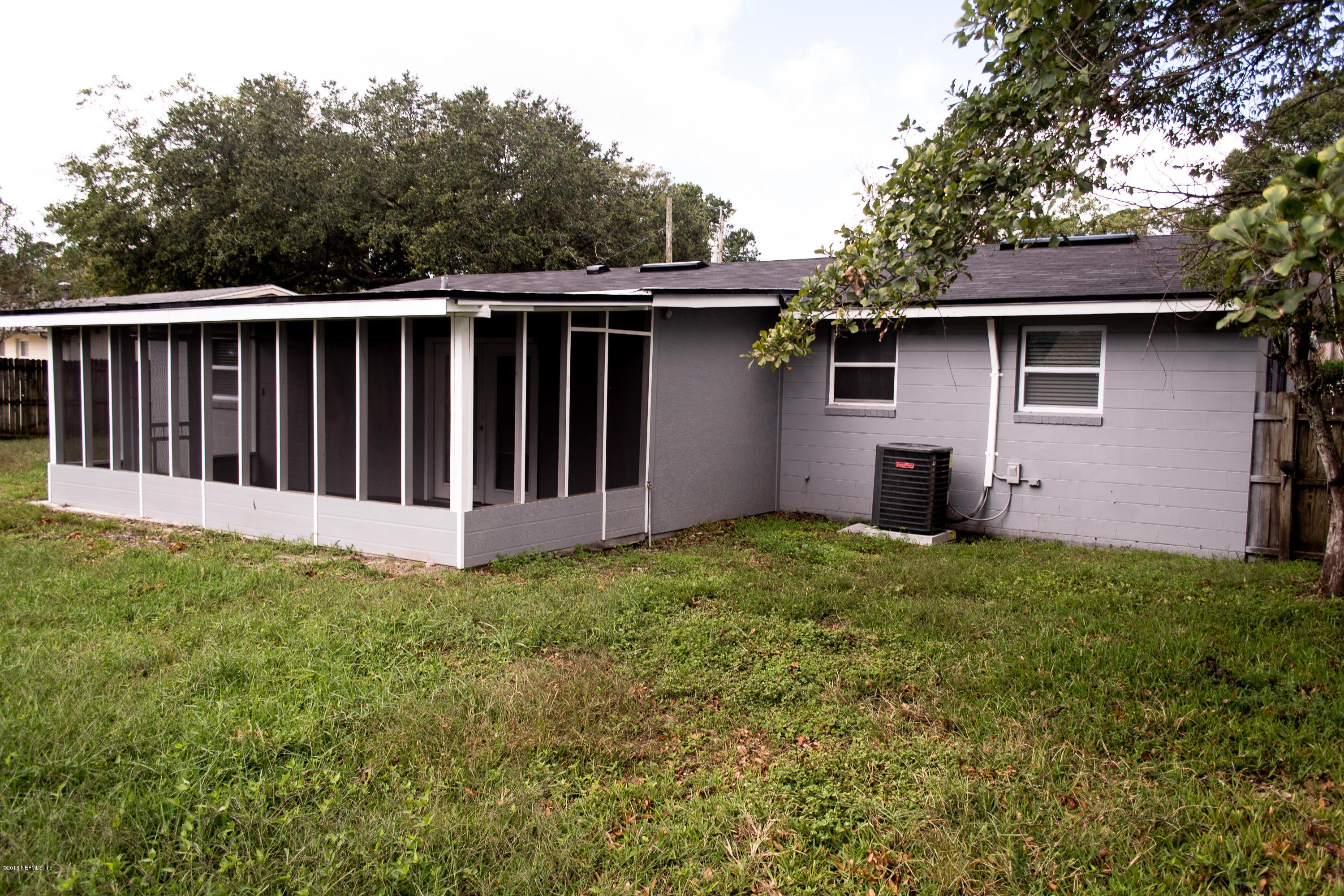 4133 Dayrl Road Jacksonville, FL 32207 - Photo 20 of 21 a view of front of a house with a yard