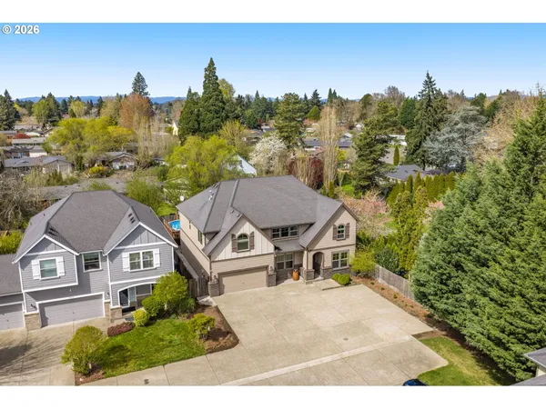 an aerial view of a house with a garden