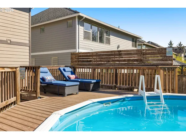 a balcony with view of outdoor seating