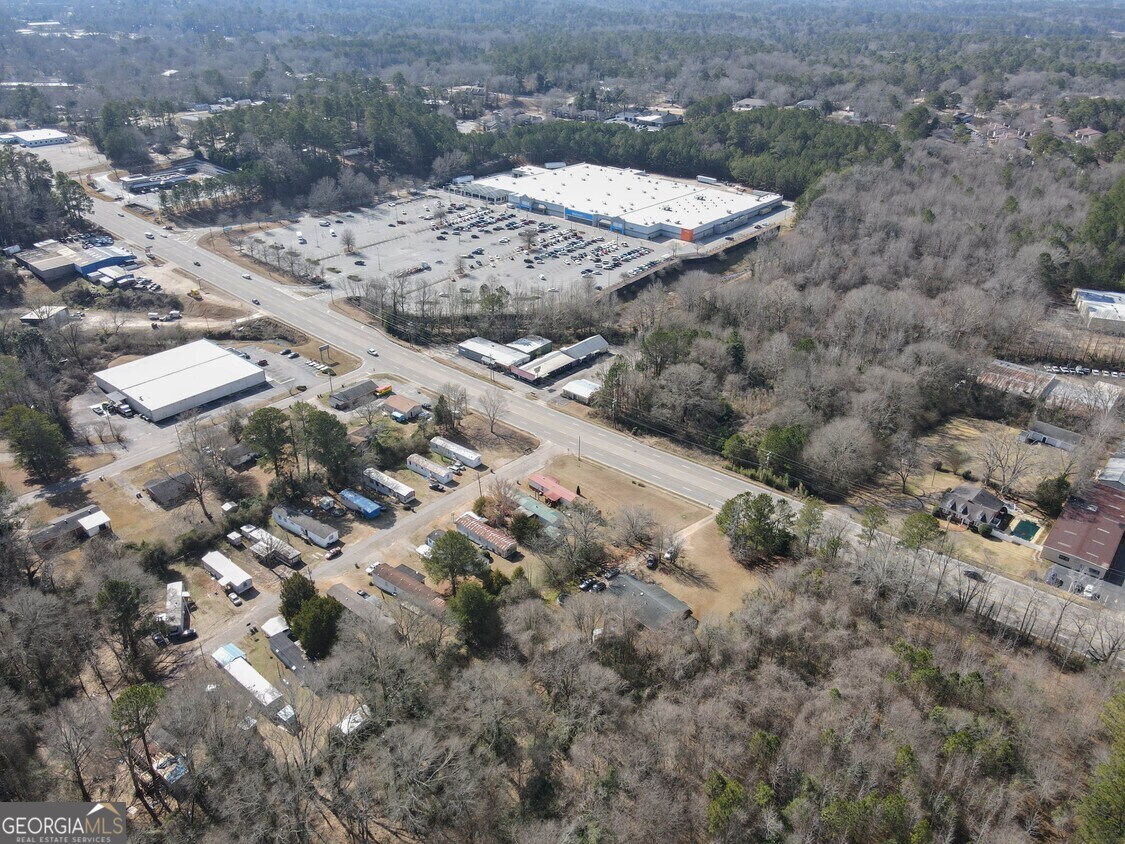 828 New Franklin Road LaGrange, GA 30241 - Photo 2 of 7 a view of a dry yard with lots of trees